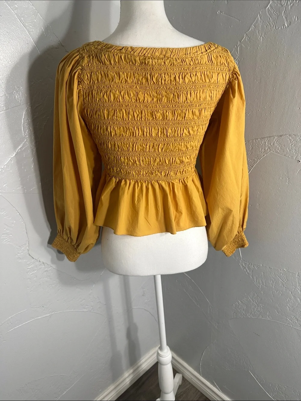 Free People mustard Yellow Smocked Peplum Blouse.
